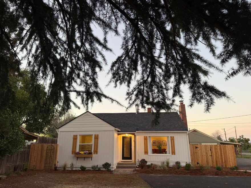Step into this storybook cottage that's been completely transformed—offering the charm of yesterday with the peace of mind of modern updates. Everything has been taken care of for you: new roof, windows, siding, trim, fence, fresh paint inside and out, plus colorful, landscaping that makes the home as inviting outside as it is inside. The kitchen and bathroom have been beautifully remodeled, while the original wood floors have been lovingly refinished to add warmth and character. With brand-new plumbing all the way to the street and some updated electrical, this cottage truly lives like new—just move in and start enjoying!
Owner is a licensed real estate agent
