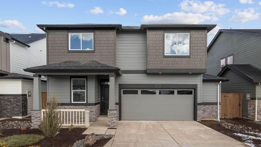 Red Tag Sales Event Happening Now!! SPECIAL RATE and closing cost incentive with use of builder's preferred lender!!  Visit Stevens Ranch in Bend! This master-planned community offers access to the brand-new Bend library, shops, dining, walking paths, and caves, making it an exciting place to call home. The Coral is a 2,230 sq. ft. two-story home with 4 bedrooms, a main-level den, 2.5 baths, a covered patio, and an extended garage for extra storage or a workspace. The main-level den with double doors provides a perfect home office. The great room features designer finishes, including a fireplace with a floor-to-ceiling painted accent wall. The kitchen includes shaker cabinetry, quartz countertops with full-height backsplash, and stainless-steel appliances, such as a gas range and microwave. The spa-like primary suite offers a double vanity, walk-in shower, soaking tub, and walk-in closet.  Sales office hours are 10am - 5:30pm daily. Photos are representative; features/specs may vary!