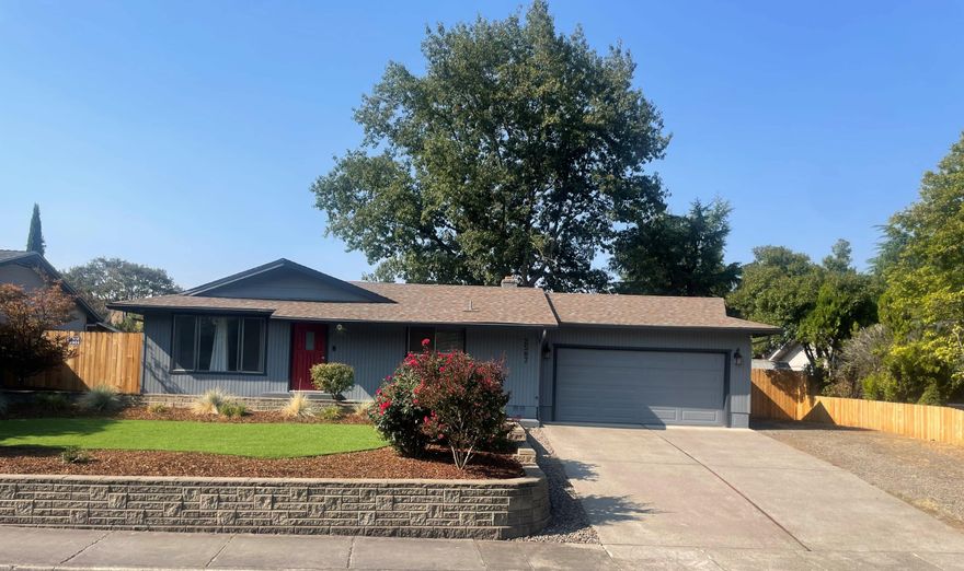 Beautifully renovated three-bedroom, two-bathroom home. One of kind countertops, open floorplan with attractive island allowing for entertaining and gathering. Upgraded cabinets/cupboards. Huge back yard to allow room for recreation.  Mature oak tree provides shade throughout different times of the day. Landscaped front yard. Pergo laminate flooring throughout, except two spare bedrooms newly carpeted. Upgraded LED lighting fixtures, and gas fireplace whitewashed. New exterior and interior paint. Potential RV parking area. Updated gas furnace and heat pump. Located just blocks from Cedar Links Park.