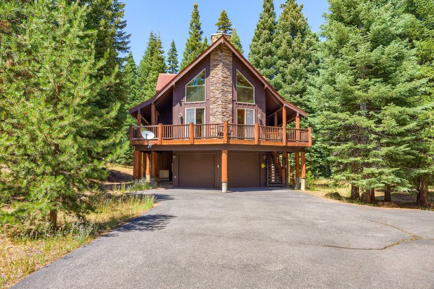 Luxury and thoughtful details highlight this spectacular cabin located in the Lakewood Village community amongst some of the most beautiful wilderness Southern Oregon has to offer. Located 40 mins from major cities and 5 minutes from Lake of the Woods, this 1.2 acre lot backs up to forest land - setting the tone for the ultimate getaway! No expense was spared in this 3 bed/2 bath home. It boasts a 4 car garage, wrap around deck, hardwood floors throughout, custom pine slatted walls and soaring ceilings. The main floor has two roomy bedrooms, a full bathroom, a large, open upgraded kitchen with lots of storage looking out into the living room. A custom pine staircase leads to the top floor which has a tv/sitting area that could also be used as an extra place for sleeping. The upstairs primary bedroom is spacious, has gorgeous private views and a floor-to-ceiling stone fireplace. The home has more upgrades than we can list. Airbnb possibilities make this a fantastic opportunity!