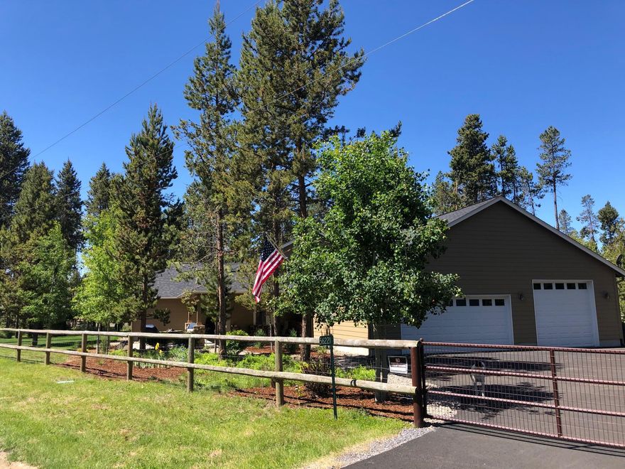 This private property in the Oregon Water Wonderland makes for a peaceful space to call home, or could alternatively be used a short-term vacation rental in between your visits. The one acre corner lot has beautiful forest surroundings & landscaped borders, and is conveniently located steps to river access and just a short distance to the community marina. The luxurious primary suite looks out to the backyard, and 3 additional bedrooms allow multi-purpose usage like the gym. With 3 garage bays, a shed and outdoor RV/ boat parking there is ample storage for all of your recreational toys and supplies. This property will be your gateway to the scenic beauty of the Deschutes River, Wickiup Reservoir, Paulina Lake, Fall River Falls, golf courses, the Village at Sunriver, and much more.