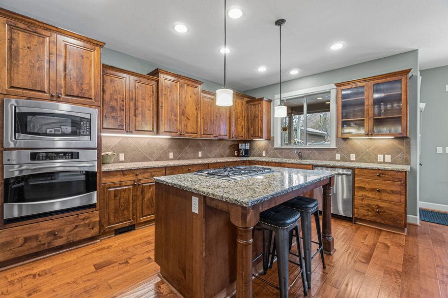 This stunning Renaissance Home offers 3,551 Square Feet featuring 4 bedrooms, 3.5 baths, an Office/Den (with a closet), Large Bonus Room, Upstairs Loft Area with Built In Cabinets, and an open Kitchen and Living room area hosting excellent natural light through all the bright windows. You will find beautiful finishes throughout the home including Stainless Steel Appliances, Hardwood Floor, Alder Cabinets, Granite Countertops, a cozy gas fireplace, Butlers Pantry, Central Vac System, Dual Zoned Heating, and AC. This home also offers a fully landscaped front and back yard with sprinklers. The neighborhood of Aspen Rim backs up to the Deschutes River with lots of trails close by, a community pool, park and community area.