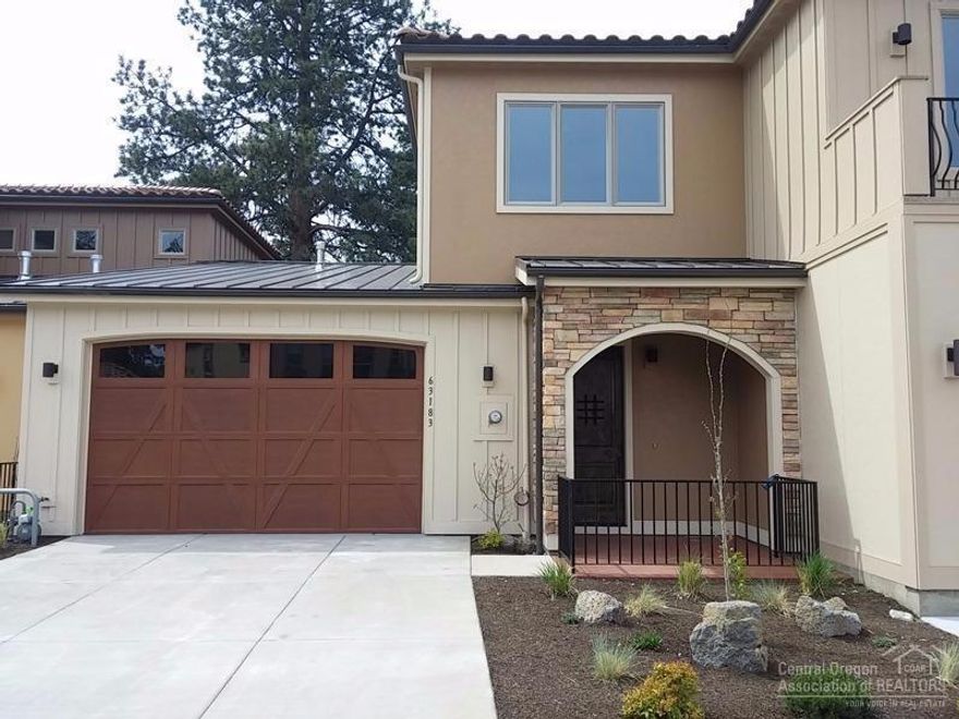 New Luxury town home in fabulous Tuscany Pines exclusive west side addition. Main level master. Tuscan style with tile and metal roof, stucco/wood exterior, stone and wrought iron accents. 10 ft ceilings, solid wood doors and trim, hand textured walls, GE Monogram appliances including 36 5 burner cook top. Granite counters throughout, hardwood floors, tiled master shower, 2 car garage and more. HOA dues provide beautiful community pool, clubhouse, and gym and exterior maintenance and insurance.