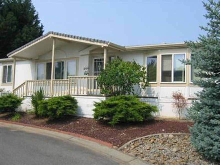Informational Purposes Only. Manufactured Home only no land included. An Oregon Motor Vehicle Dealer License is Required to show or sell.This sunny and charming home features 3 Bdrm, 2 Ba. Lovely Kitchen with island and large dining area that looks out at covered deck. Other features large living room and family room. A nice fenced backyard and a two car carport with storage unit . This is a must show! Guest parking close by!