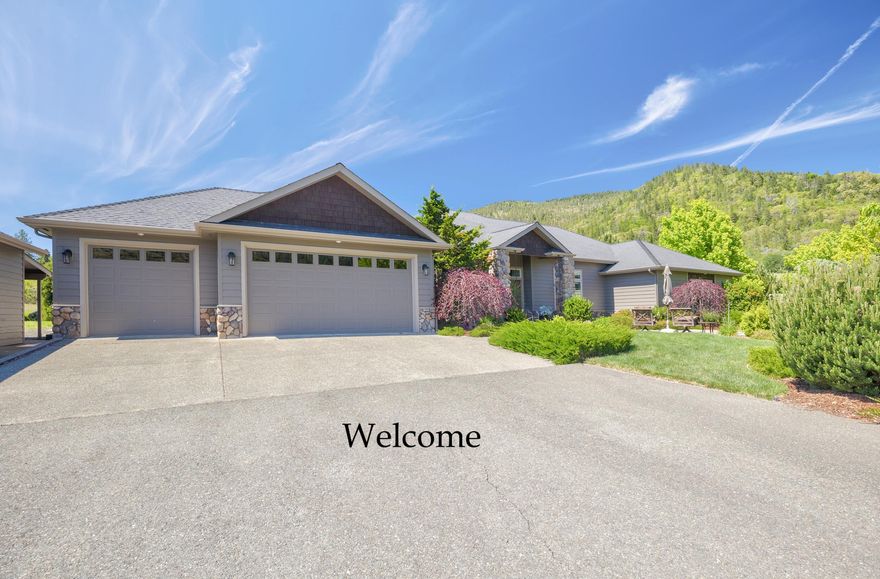 Discover the perfect example  of luxury living in the coveted Sexton Meadows Subdivision in the North Grants Pass area. This 2005 custom-built, single-level home, set on a sprawling 5-acre lot, offers 2772 sq ft of elegant living space with 4 spacious bedrooms and 2 ½ baths. Featuring vaulted ceilings, an open floor plan, and a large dining room, this residence is designed for comfort and entertaining. Enjoy modern amenities such as a heat pump, granite counters, jetted tub, gas fireplace and a variety of flooring options including carpet, laminate, and tile. The property also includes a 3-car attached garage, a 24' x 32' detached shop with an additional shed, and a beautifully landscaped pond and patio. Appliances are included, along with a custom-built front door and a gated, paved driveway. High producing well. Schedule a viewing today!. Easy freeway use just 11 minutes to town. Make this dream home yours and enjoy the serenity and sophistication it brings.