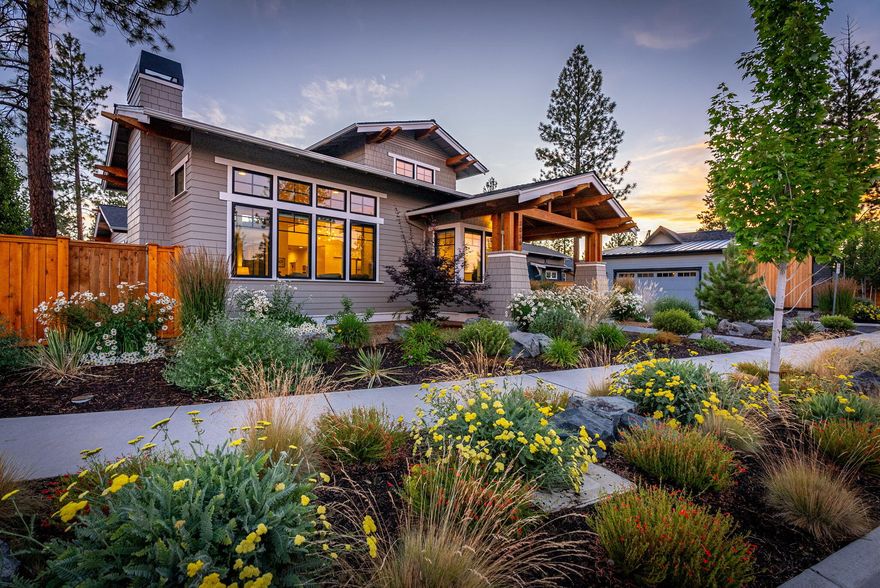 Discover elevated living in this stunning 2,454 SF single-level luxury home in the Discovery West neighborhood, where community and connection thrive. This thoughtfully designed 3-bedroom, 2-bathroom residence includes a dedicated office for seamless work-from-home convenience. Adorned with premium Hunter Douglas shades throughout, the home exudes sophistication and style. The expansive 3-car garage, featuring a sprinter/RV bay, and offers ample space for vehicles and outdoor gear. Outside, the fully landscaped property boasts an extended fenced side yard with a paver patio perfect for BBQs and entertaining. Embrace the Bend lifestyle in this meticulously crafted home, where modern elegance meets the warmth of a connected community.