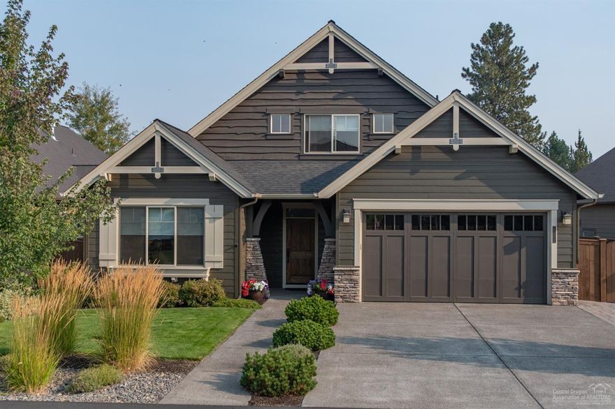 Like-new Pahlisch Home in The Bridges in SE Bend. 3BR, 3BA with master on main level On the canal with great fencing for kids or pets. Stone fireplace in great room, hardwood floors, tile Huge bonus/media room (or 4th BR) upstairs that has full bath. Beautiful finishes throughout! Resort-like amenities: pools/hot tub/basketball/fitness center/park & club house! An amazing home in a wonderful family neighborhood. Check this out!