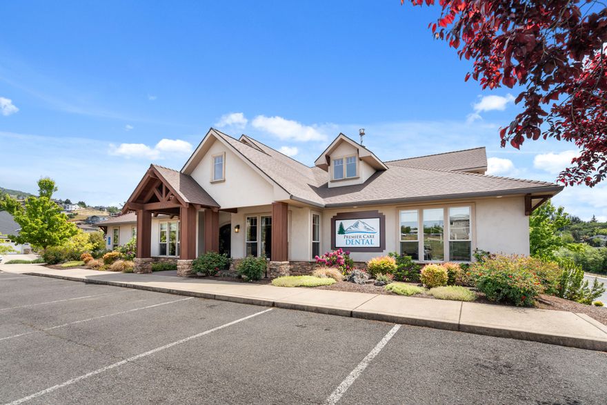 Beautiful, Long term NNN leased dental building together with the adjacent undeveloped .61 Acre lot located in the prestigious East Medford area. PremierCare Dental Centers has leased this property since February 6, 2015 on their original 15 year lease (expires Feb. 6, 2030). The building currently has approx. 6,877 square feet finished with an additional 2,000 sf of unfinished storage area in the basement portion of the building. Currently, PremierCare utilizes approx. 200 sf. of the basement with the remaining 1,800 sf. being vacant storage. Please note that although the property historically has been single tenant, Landlord has the right to lease the 2nd floor (+- 1,500 sf), basement (+- 2,000), and/or adjacent lot to another tenant with no reduction of current Base Rent. Landlord has given permission to Tenant to occupy the loft a portion of the basement, and the additional lot until such time as Landlord wishes to find another tenant, or develop.