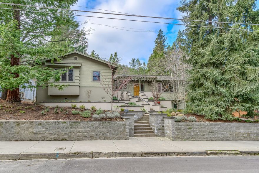 Beautiful contemporary craftsman home with detached legal ADU that overlooks Lithia Park. No detail was overlooked in the design of this home (Carlos Delgado architect) that underwent a down-to-the-studs renovation in 2000. The main house has single level living with 4 bedrooms, 3.5 bathrooms and is graced with solid Madrone wood floors and custom cabinetry throughout. The open floor plan,vaulted ceilings and RAIS wood stove create a wonderful great room. The kitchen is a chef's dream with top end appliances, concrete counter tops and dedicated baking area. The primary bedroom is a true oasis with a sitting room, two walk-in closets, large en suite bathroom and sliding door that opens to a private patio and hot tub. The grounds (Solid Ground Landscaping) have recently been replanted and include an in-ground pool. The detached guest home is similarly appointed. Please see attached document for full list of features as there are too many to include here. Truly a unique opportunity.