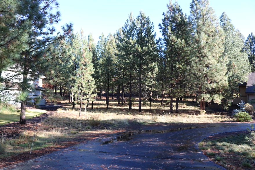 This is a spacious 0.32 acre lot in Widgi Creek. Located on a private cul de sac with wonderful, cheery southern exposure and backing up to the 5th fairway on the Widgi Creek golf course. Utilities at the road. Private gated entry into the subdivision. Enjoy all the peaceful amenities of living in the forest, near the Deschutes River, yet only a few short minutes to Bend, and you are already on the way to Mt. Bachelor and the Cascade Lakes.