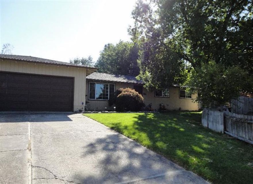 This comfortable ranch style home was built by W .L. Moore. The home is at the top of a very private cul-de-sac, not far from Lone Pine School. The home has a large living room, separate den with a fire place, and a dining area off the kitchen. The interior of the house has been freshly painted, to enhance the new lighting fixtures, tile and laminate floors. New vinyl windows, and a new roof installed in 2007. The wonderfully private back yard has large mature trees that have recently been shaped and trimmed. Additionally, there is a Raised garden area and a convenient storage shed.
