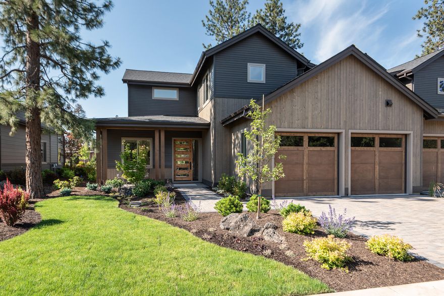 Newly completed and move in ready, this 2,873 sf two story Pine Marten townhome features a main level primary suite, an additional en-suite and 2 bedrooms with a jack and jill bathroom upstairs, powder room, open kitchen, great room, office and 2 car garage. Interior finishes include oak flooring, custom cabinetry with pull outs, Jenn-Air appliances, designer tile, solid core doors, solid surface counters and more. The park-like setting is perfect for enjoying outdoor living and entertaining. Just a stone's throw to Bend Golf and Country Club, this home is in a great location with easy access to everything Central Oregon has to offer. Why look anywhere else? Come home to 1925!