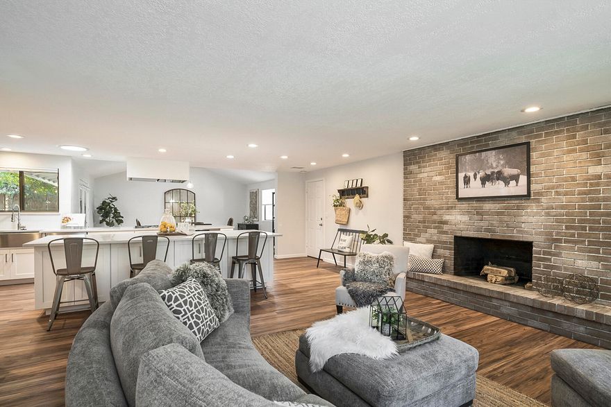 Beautiful home on a private lot right in the heart of Bend. As soon as you drive up to this home you notice the tall shade trees, beautifully landscaped yard and the well-kept homes that line the street. As you walk inside, the newly renovated kitchen with two eat in bars, a pantry, solid surface counters and open living space will have you dreaming of entertaining friends and family. This home lives perfectly indoors and out- leave the backdoor open to seamlessly enjoy the huge private backyard that is fully fenced and even includes several gardens beds and a greenhouse. With 5 large bedrooms this house has room for everyone to spread out! The double car garage provides tons of storage and the RV parking space is perfect place to keep all of your toys. You don't want to miss your opportunity to own a little piece of paradise in Bend.