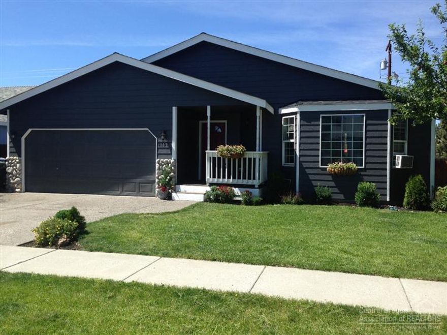 Completely renovated single level home in Bends desired NE Neighborhood close to Medical Facilities and Excellent Schools! This home has a Gas Fireplace and Open Vaulted Ceilings. A large back yard that is fully fenced with a nicely landscaped and irrigated front yard. Laminate wood floors through out home with black ice marble tile on kitchen counters and backsplash. Both bathrooms are tiled and a new IKO Roof installed. French doors that lead out to a stamped and colored concrete patio!