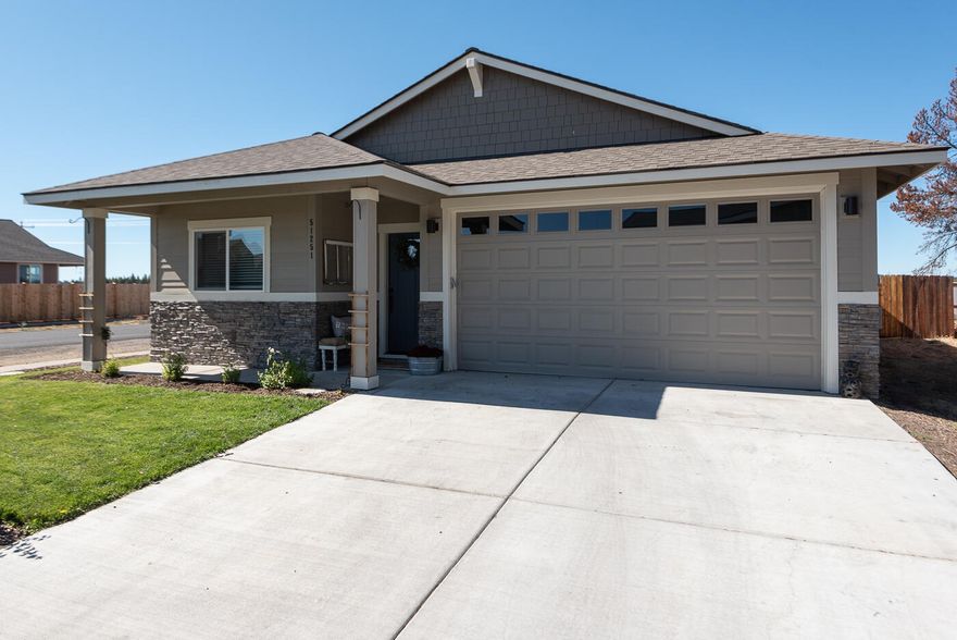 Immaculate single level NW Ranch style home situated on a .14 acre corner lot with mountain views. Completed in Summer 2019 this 1,456 sq. ft. Arbor Built home features 3 bedrooms / 2 bathrooms, spacious open floor plan with tons of natural light plus many builder upgrades including designer chosen finishes, laminate flooring throughout main living area and fully finished garage. Beautiful primary suite with large bath, walk-in closet and double vanity. Well separated guest bedrooms and full guest bath. Full sized laundry room and forced air heat. Spacious fenced backyard with raised garden beds and extra side parking and storage area. Conveniently located in the desirable neighborhood of Huntington Meadows near schools, restaurants and shopping.