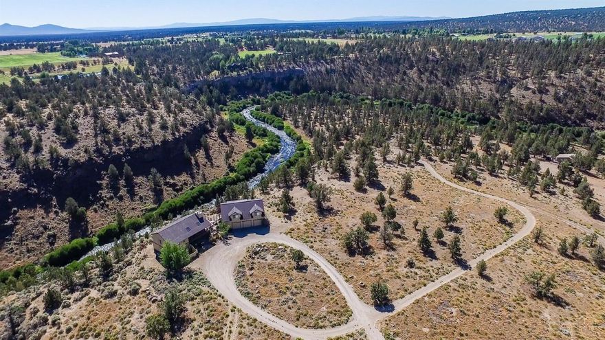 Very rare opportunity to own over 9/10 of a mile of world famous Deschutes River frontage. This stretch of the middle Deschutes has stunning scenery, abundant wildlife, rainbow and brown trout and crystal clear water. Private road on the property gives vehicle, horseback, or walking access to this entire stretch of river for private access to swimming holes, famous fishing water, riverside trails. A major bend in the River creates a natural, flat, accessible peninsula at river level for camping, gathering, future barn/fishing lodge, etc. Home is perched on a prime rimrock location for drinking in booming mountain views in front or canyon/river views behind. Total of 124 acres of EFU zoned land includes 20616 Harper Road, and 20800 Harper Road. Possibility of an additional buildable lot with a lot line adjustment (buyer to do own due diligence). All of this literally just minutes from downtown Bend, Redmond airport and historic Sisters, Oregon.
