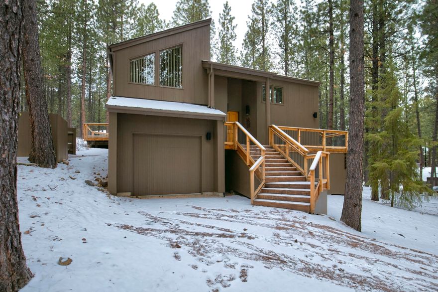 Best buy in BBR! Located in the prestigious Glaze Meadow Section of The Ranch on .64 acres, this beautiful split level home features views of the Glaze Meadow Golf Course and is in a pristine forest setting. The main level has an open concept, with a recently remodeled kitchen open to the dining and great room with wood stove to keep you warm and cozy in the winter. Two primary suites on main floor as well as a wraparound deck to enjoy the views of the course and our starry nights. The lower level features two additional bedrooms, full bathroom, laundry and family/bonus room. There is another deck on this level as well an attached single car garage, central heating/air conditioning and the home is being sold turn-key and fully furnished.