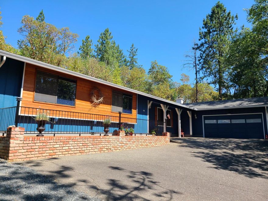 This lovely ranch home is tucked in the trees and has recently been painted inside and out. Kitchen offers a stunning brick backsplash w/coved detailing over the range, pantry, dishwasher, trash compactor, stamped metal ceiling, lots of cabinets and breakfast bar. In the large laundry room is a utility sink, table for folding clothes and a mounted hanging rack for drying your delicates. The family room has ship lap wall covering and a fireplace, could also used as a media room. Off of the dining room leading to the back yard is a covered porch, which is great for relaxing and having a BBQ.  The  pergola makes a beautiful addition and a deck across the way which has been planted with beautiful flowers and herbs is very stunning. Just a short jaunt down the driveway is a permitted 3 stall covered pole barn lean to. Don't miss your opportunity on this one.