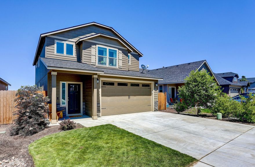 Like New 2 Year Young Home In Northwest Redmond! All the work is done, fencing, landscaping, sprinkler system and window treatments. Just move in and enjoy this beautiful home with granite countertops, stainless appliances, covered outdoor patio area and views of the Cascade Mountains. This light and bright home features an eating bar, gas fireplace, central A/C and gas furnace. Attached extended 2 car garage is insulated and finished with door opener. Great location - close to schools, shopping, parks and restaurants. The large great room has plenty of room for entertaining or relaxing watching the game. Built in desk is great for remote workers. Nice sized bedrooms, large primary bedroom, luxurious bathroom suite and oversized walk in closet. Natural gas furnace and central A/C have a dual zoning control. The backyard is an oasis with large covered patio for BBQ's and relaxing with a cold beverage. Come take a tour of this incredible home in a very nice neighborhood.