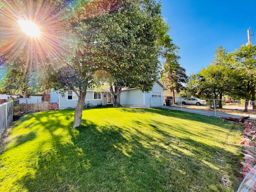 Very nice 3 bedroom 1 bath with garage, beautiful front yard with Shade trees and nice view of town, raised garden beds, private back yard with deck, fenced area with a chicken coop, updated windows, gas furnace, wood stove, swamp cooler, tile, laminate, and carpet flooring. Must see to appreciate. Make your best offer.