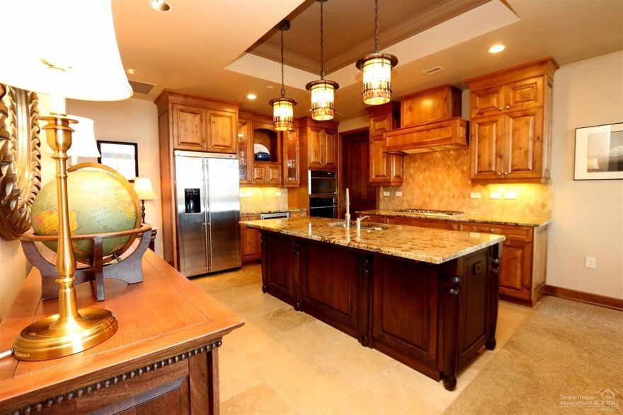 A Penthouse Single level Condominium in the Heart of Bend's Old Mill District. Gourmet Kitchen w/high end woodwork and finished throughout. Stunning Mountain and River views on the 4th Floor with your own Large Private Balcony. A double Master layout with spacious Master Baths and Large walk-in closets. Access to the Common Area includes a Grand Party room with a Large built in TV, Fireplace and sound system. Adjacent Kitchen area and bathrooms.Two deeded parking spaces.