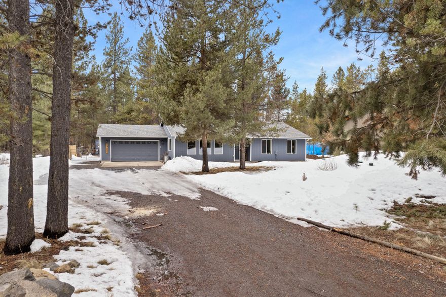 Sunny, single level home situated in a serene setting amongst the trees with a private neighborhood river park!  Some of the features of this tidy ranch property include an open floor plan with lots of windows and great light, beautiful new vinyl plank floors and trim, a new cozy and efficient wood stove in the great room, new exterior paint, updated interior paint, new hardware and lighting, stainless steel appliances in the open concept kitchen with a huge walk in pantry/laundry room, a generous master suite with a large walk-in closet and views of the wooded backyard. There is plenty of room to store your toys on this ½ acre fenced property plus a cool, painted storage crate/shed for extras; this property is a short distance from La Pine state park plus neighborhood access to 100's of acres of National Forest!