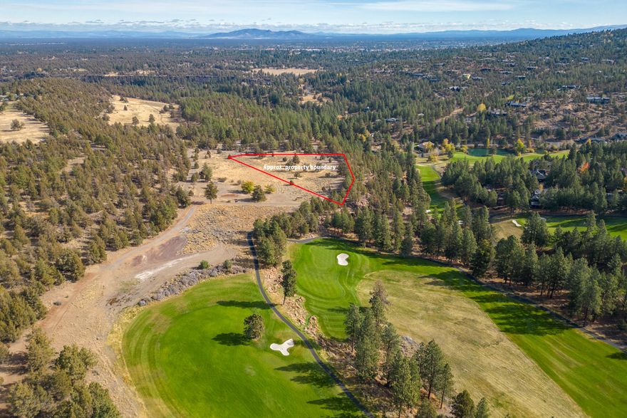 This is a rare and exciting opportunity to own an outdoor paradise just minutes from the vibrant heart of NW Bend. This nearly 5-acre property boasts stunning Ponderosa Pines, lush meadows, and an awe-inspiring natural setting. With paved road access, it's the perfect location for your Central Oregon retreat. Imagine waking up to sweeping panoramic views, surrounded by abundant wildlife, and ready to enjoy some of the best outdoor recreation in the area. Whether it's fishing in the nearby Deschutes River, skiing in the slopes of Mt Bachelor, or sampling the renowned microbreweries and restaurants in Bend, there's never a shortage of things to do. The possibilities for this property are endless.