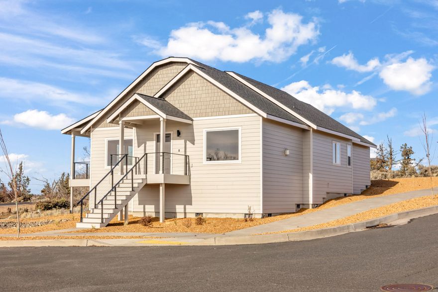 Don't miss out on this incredible opportunity to own a brand new, custom built home at an affordable price in the beautiful Yarrow subdivision. 3 bed, 2.5 bath home features 1,571 sqft of high end living space & incredible mountain views. Interior features include 9 ft ceilings, custom white cabinets w, soft close hinges, quartz countertops, laminate plank floors in the main living area, stainless appliances, fiberglass walk in shower in primary bath, gas fireplace, gas water heater & so much more! Smart features include smart switches on the front porch, deck & kitchen, smart thermostat, smart deadbolt, & smart garage door opener. USB plug in kitchen & primary bedroom. Prewired for solar w/ 240 amp circuit & conduit to attic. Outside you will find front & backyard landscaping w/ irrigation, composite deck w/ wire cable railing. Covered front porch. Finished double car garage. Seller is Oregon licensed real estate broker.