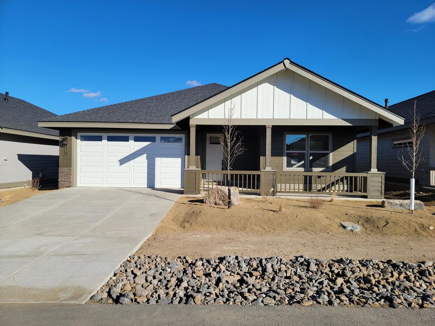 Dry Canyon Village, Central Oregon's premier age restricted 55+ gated community.  Welcome to the single-level Currant floor plan with an open great room style living, dining & kitchen areas.  The kitchen boasts a 5 piece SS Kitchen Aid appliance package, solid quartz counters, walk-in pantry, abundant counter space with an island & breakfast bar & a sliding glass door that leads out to the covered back patio.  The master suite features a double vanity bathroom with a mud-set tiled shower & walk-in closet.   Two additional bedrooms would make great office space or room for out of town guests.   An upgraded trim package with fully wrapped windows, vinyl plank flooring, abundant storage throughout the home & double car garage finishes the interior features.   A backyard fencing option is available if you need to keep Fido in.  The private clubhouse will feature a yoga studio, free weights, 3 lane lap pool & pickle ball quarts.  Miles of paved trails throughout the community!