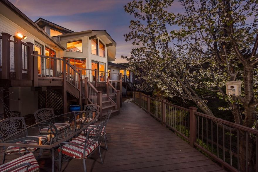 This beautiful home is turnkey. The kitchen is beautifully appointed with Corian Counter tops, stainless appliances, Kitchen pantry, baking center, and a gorgeous island vent hood. Master bedroom and bath with modern soaking tub and separate shower are on the main level along with gorgeous vaulted ceilings in the living room. Every bedroom has a large walk in closet and the home has ample storage throughout. A large dining area and an attached multiple-level trex deck makes this home perfect for entertaining. Come and see this gorgeous move-in ready home.