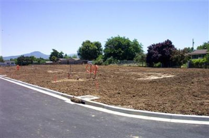 Located near shopping, schools and convenient access to I-5. Lots available to purchase separately or to build to suit. Bring your builder or we can help with house design, financing and builder selection for your buyer. Lots are approximately 50' wide by 118' deep to accept minimum 1300 square foot homes and still have large backyards. Architectural review approval required before start of construction.