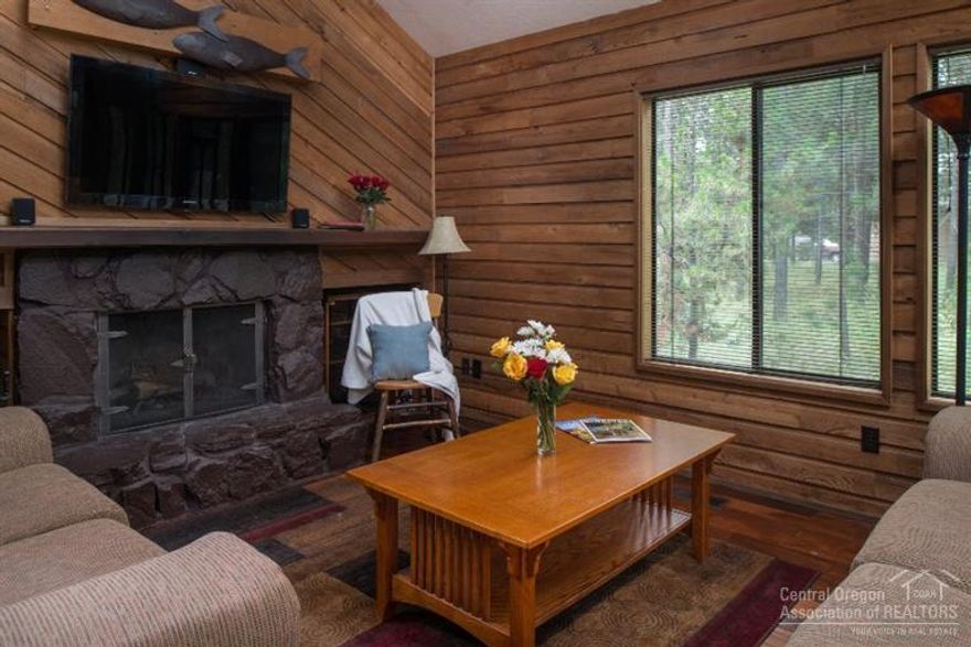 Location! Location! Location! Near the majestic Deschutes River and on a street of beautiful homes. This 3 bedroom + loft has been remodeled in 2013. New floors, kitchen counters, cabinets, appliances, and bathrooms. Enjoy the hot tub or BBQ on the deck while looking at acres of common area. This cabin is a real gem! Wood burning fireplace, vaulted great room & bedrooms. Fully furnished. There is a path w/ a bench at the end of the cul-de-sac that leads to the river for gazing at the view or casting a pole.