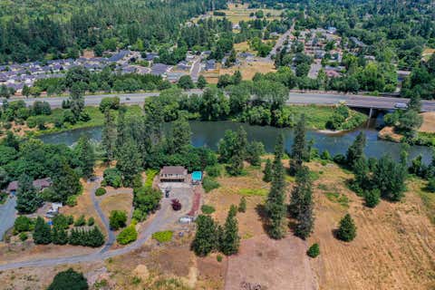 Tiny photo for 8775 Rogue River Highway, Grants Pass, OR 97527 (MLS # 220226561)
