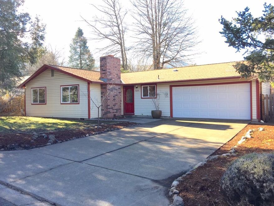 Rare opportunity! Single-level home in Ashland under $350,000! This home is in great condition and is located near many new homes in Helman Springs, very close to downtown, and walking distance to Helman elementary school. The home has 3 bedrooms, 2 baths, a living room with fireplace, a kitchen & dining room area with access to back yard, an attached 2-car garage with shelving included, bamboo floors throughout, and a 95% efficiency gas furnace. The entire interior has a brand new coat of paint including the cabinets and baseboards. The lot feels spacious with substantial front and back yards and mature trees. The back yard is enclosed by wood fencing and includes a garden, composting area and covered patio.