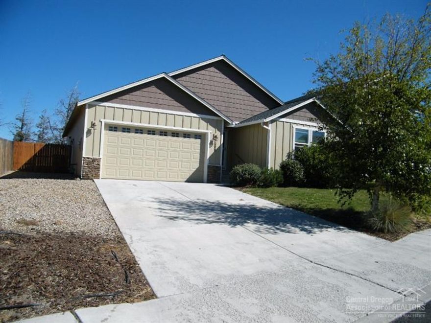 Great value in this well appointed home. Open floorplan with vaulted ceilings lots of windows. Spacious island kitchen with eating bar and pantry. Recessed lighting, premium fixtures and a gas fireplace. Many energy saving features built in during construction. Master bath has a 5ft step in shower. Skylights in both baths. Efficient heatpump for year around comfort. Fully finished double car garage w/auto opener. Landscaped with auto sprinklers. Rear fenced yard and RV area. Features list in attached docs.