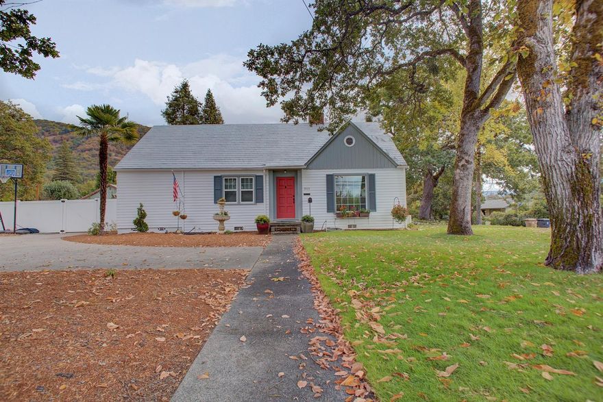 All the updating has been done ~ this home is just waiting for you and your family to call it your own! Beautiful and spacious, this 4 bedroom/3 bath is located in a wonderful neighborhood, just a short distance from District 7 schools, parks, shopping and downtown restaurants. The large lot offers great parking for RV, boat and/or vehicles. Plus, there is a 2 car detached garage with lots of storage. The front and back yards are beautifully maintained with lots of room to entertain. Backyard is fenced and also irrigated. The home boasts a formal dining room and a huge den. Living room has a gas fireplace for those cool mornings and chilly nights. There is new carpet and tile throughout the home along with refinished hardwood floors. Aluminum lifetime roof. You don't want this home to be the one that got away!! Call for a viewing today!