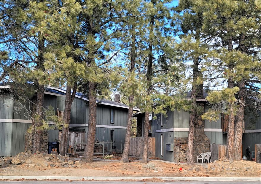 Location, location, location!  Take a look at this cute condo in SW Bend with low-maintenance living.  Perfect for first time homeowner or investor.  Lots of upgrades in the last few years including new appliances, wiring, paint, mini-split heat pump, flooring, light fixtures and more!  Enjoy this cozy condo with wood burning fireplace in the living room.  Step to the private patio, accessible from the living room and kitchen.  Access upstairs deck from both bedrooms.  Lots of storage including large closet off of deck and an under stair closet.  Adjacent to Bend Golf and Country Club and future park right across the street!  HOA includes water, sewer, street lights, HOA insurance and exterior maintenance.  Please don't bother residents or tenant and enter complex only during showing hours.   Showing hours are Tuesday, 10 - 3, Wed 10 - 1, if needed, will add Sat 9-12, Sun 10 - 1.  Don't miss this terrific home!