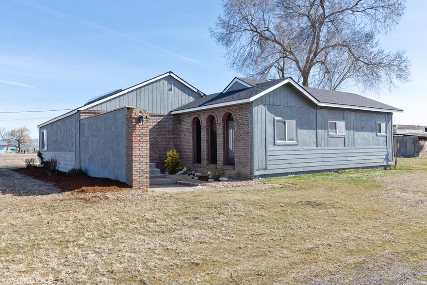 This updated home is located just outside of town and it has acreage! It has 5.51 acres, a large shed and a horse barn with tack room. The home has 1680 sq. ft. and 3 bedroom 2 baths. Kitchen has just been updated with new cabinets, granite counter top and stainless steel appliances. New interior and exterior paint. Both bathrooms have been updated. New floor coverings, light fixtures and HVAC with AC. New septic tank and a new roof. This is a HomePath property.