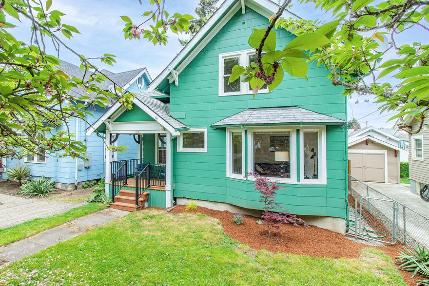 One Block from Kenton Shops and Restaurants! Incredible location. Four bedrooms (one on main, three up) and two full bathrooms (one on main, one up). Updated, charming covered front porch and back deck. Living room with huge bay windows. Dining room with built-ins. Unfinished basement with even more potential to expand. Spacious fenced back yard with firepit area. Click v/tour link for 3D home tour! Home Energy Score: 1