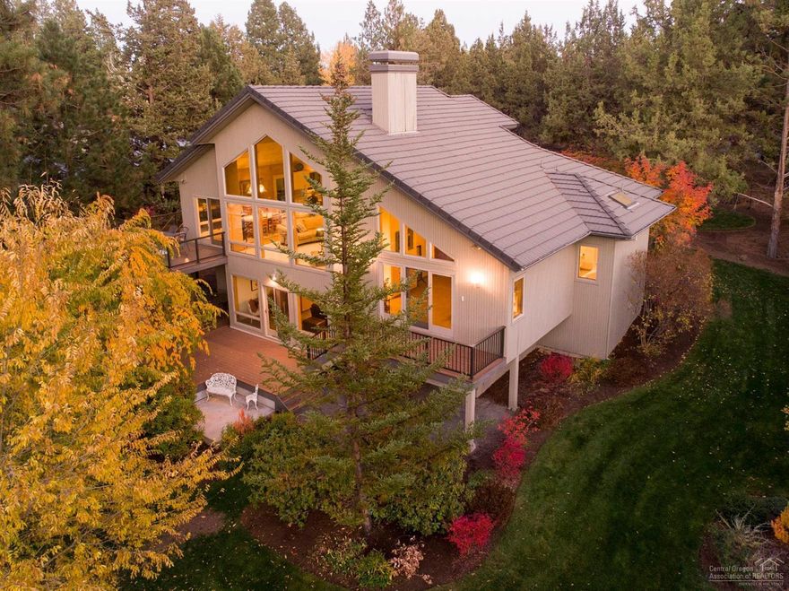 Prime riverfront location on Bend's Westside w' private river access & amazing views. Quality built by current owner & meticulously maintained, this one of a kind riverfront home sits on an estate lot of .92 of an acre. Approx. 2/3 of the mature landscaped property is fenced & gated. The Smart Home has 4 bedrooms, 3.5 baths, an office loft & generous bonus room. 3 of the bedrooms have their own bath for good privacy & bedroom separation. The Great Room is an open floorplan centered by a gorgeous River Rock FP w' a large slate hearth & amazing river views. 3 skylights & floor to ceiling windows capture natural light. Updated kitchen with Stainless Appliances and Quartz counter. Lg bonus room has custom built-ins & adjacent bedroom & bath w' private deck overlooking the river. Three private TimberTech finished view decks, 3 car garage w' three doors & one heated bay, electric car hookup & workbench. Centrally located within walking distance to downtown, river trails & parks.