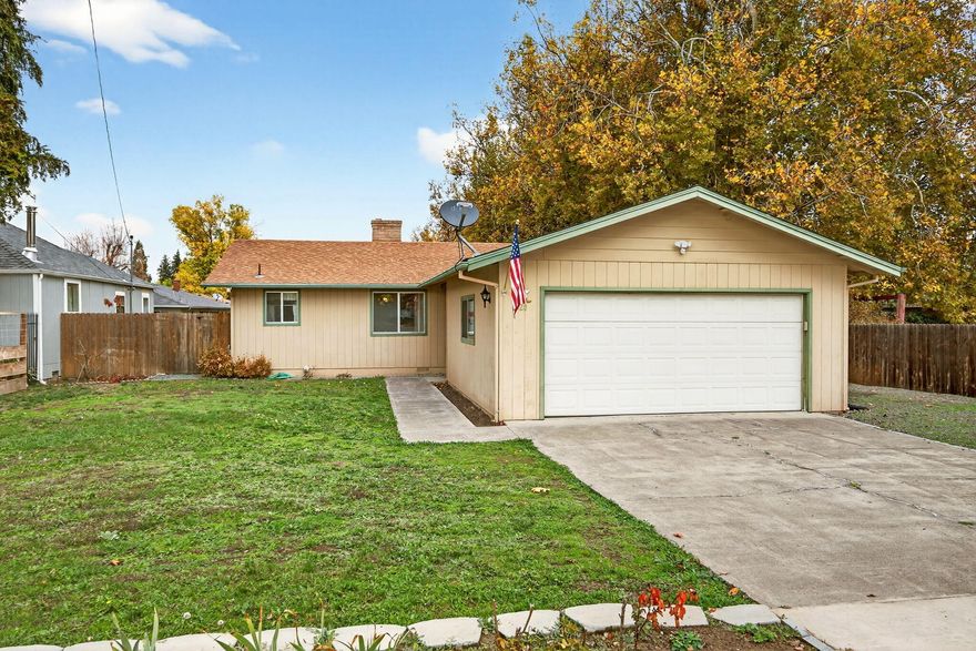 Welcome to this great home in Medford!  Just a well-cared for home with two spacious bedrooms and a nice lot with room for RV parking.  HVAC system is only a few years old and this home may be dated but is charming even featuring a hatch door off of the kitchen.  The living room has a fireplace and french doors out to the backyard.  Primary suite features a built in vanity.  This home is ready for you to make it your own!
