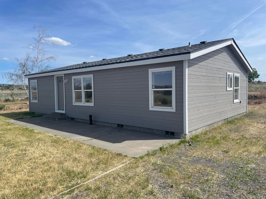 BRING YOUR ANIMALS and your vision and come check out this almost completely refreshed country home on 2.09 acres with farm views! This home has SO MANY updates, including New Exterior Paint and Siding, New roof, New Interior paint, New carpet and laminate throughout, New kitchen countertops as well as several bathroom fixtures.  This property is in RR2 zoning which allows for various kinds of livestock and 4-h animals. It also is a flat lot with plenty of extra room for a shop and for RV parking. 
Come check it out for yourself, call your favorite realtor and schedule to see it today!