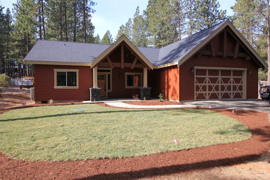 New Construction in DRW just finished!. 2071ft semi custom home by Crystal River Const. Open great room floor plan, covered porch with a very large deck, hardwood floors, masonry accents and a built in gas fireplace, luxurious master suite with soaking tub, tiled shower, large custom built in closet organizer, vaulted ceilings throughout, very open and bright, beautiful kitchen, beautiful pine treed .91 acre lot. Deatached shop 24'x30'with 10' garage door to fit taller vehicles inside.