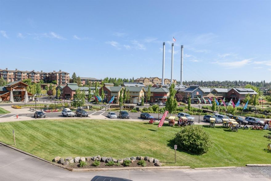 Beautiful townhome in the heart of The Old Mill District overlooks the Deschutes. Upper master suite balcony w/ sweeping river and Old Mill views. Walk-in closet with access to the elevator & en-suite w/double vanities; soaking tub/tiled shower. Fine finishes include hardwoods, slab granite countertops, stainless steel appliances and rock fireplace. Full bath/bed on main, entry level has guest en-suite bedrm, elevator serves all 3 floors. Abundant natural light. Enclosed storage connected to garage.