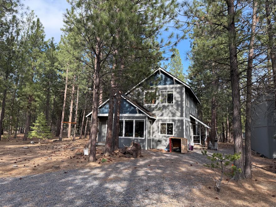 Welcome to your dream retreat in Ponderosa Pines, La Pine, Oregon! This charming two bedroom, two bathroom stick built home boasts 1,420 sq ft of cozy living space on a serene 1.16-acre lot. Enjoy the benefits of a new roof with a 50 year transferable warranty and modern laminate flooring throughout. The versatile loft area can easily be transformed into a third bedroom or office. Step outside to discover a spacious 30x30 insulated shop featuring a 700 sq ft upper room, perfect for a workshop or potential apartment conversion. With dedicated 200 amp service and multiple 220 volt outlets, it's ideal for your projects. The entire property is fenced and gated, providing a safe haven for pets and children. Located near public lands and priced to sell, this home offers a fantastic opportunity for those looking to add their personal touch and build equity. Don't miss out—motivated sellers are ready to make a deal!