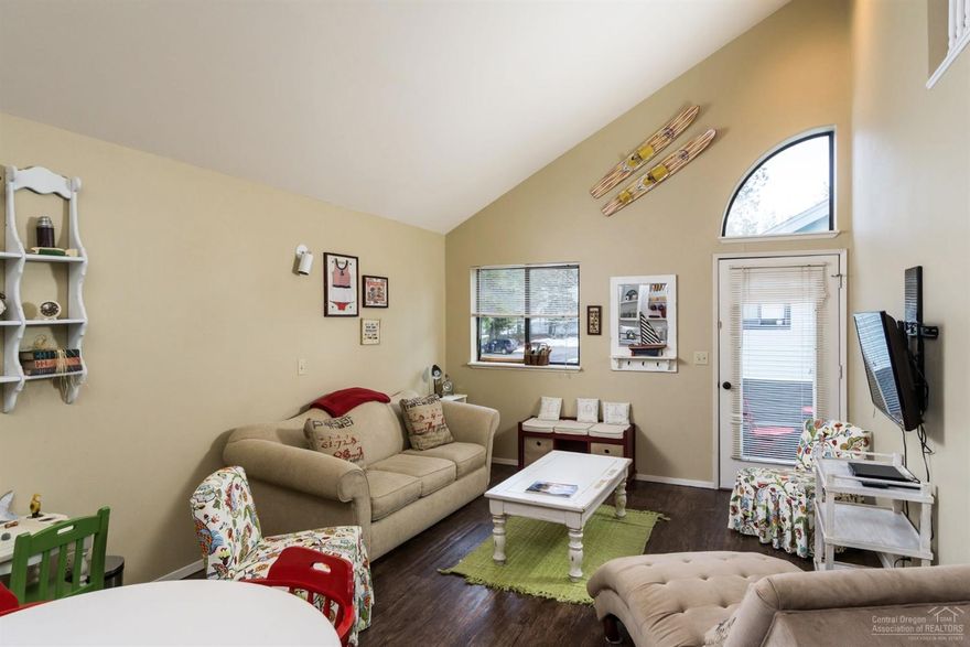 Retro Chic! Sunny & bright with Southern exposure. A perfect Sunriver getaway or full time home. This 2nd floor vaulted 1 bedroom condo offers a bonus loft area perfect for 2 twin beds. New laminate wood floors, countertops and stove. Quality furnishing package is also available to make this a turn-key home. HOA dues include water, sewer, garbage & exterior maintenance. Powder Village has a private pool, hot tub, & laundry facility and just a 5 minute bike ride to the village!