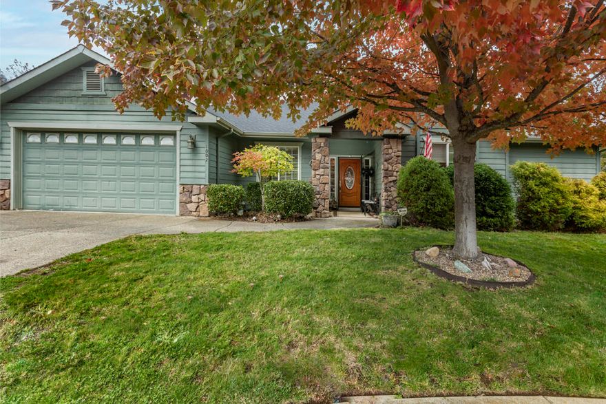 Gorgeous Corner Lot Home in Beautiful Jordans Landing Neighborhood. Over 2000 square feet of extremely well planned living area. Open floor Plan with lots of windows and soaring vaulted ceilings. Granite counters, hardwood flooring, tile, and crown molding throughout. Excellent detail and comfortable space. Showcase glass see through fireplace feature to be enjoyed in the Livingroom, Dining room, and Kitchen. Primary bedroom is a nice size with large walk in closet, and fabulous corner jacuzzi tub. Two additional good-sized bedrooms, one requires partial floor replacement & painting. As well there is a lovely full guest restroom. Landscaped yard with a nice, covered patio. Jordan's Landings Neighborhood is known for unbroken views of mountains in all directions. The schools are unsurpassed. A short 1/2 mile away is Cathedral Hills Country Park which offers hiking, biking, and horseback riding. The Grants Pass Golf club is just off in the distance. Priced to Sell. OPEN HOUSE SUNDAY 12-3