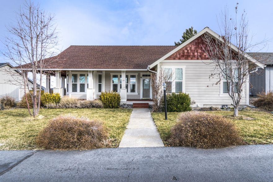 Enjoy the fabulous covered porch of this wonderful craftsman style home. lnside features include a large dining area, pantry and utility sink in the laundry room. This home is very light and bright with an abundance of windows and very well taken care of. Outside there is exceptional landscaping that includes a garden area with raised beds, strawberries, grapes and fruit trees. Located in a quiet neighborhood which includes rear-entry garage with alley access. RV Parking, covered porch, and extra patio make this a home not to miss!