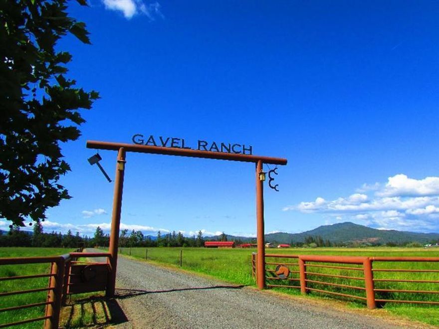 Gavel Ranch 205+- acres, approx 132 acres Irrigated out of the Rogue River & 6+- EPID,Flood & Wheel lines.This one of a kind ranch has 4 homes and an additional homesite approval,office,workshops, barns,indoor arena,multiple equipment sheds. There is an Indoor Pool between the Main home & 2nd home. Indoor clear span metal arena w 9stalls &4paddocks. Solid Steel-covd working corrals.All steel fencing-cross fenced. 1/2mi of Rogue River Frontage 3/4mi of Reese Crk.Private Bass pond, salmon, steelhead fishing. Main home is 4241sq ft, 2nd home is 2272sq ft 3bdrm 3bath (remodeled 1996), 3rd & 4th homes are 2bdrm/1bath homes.