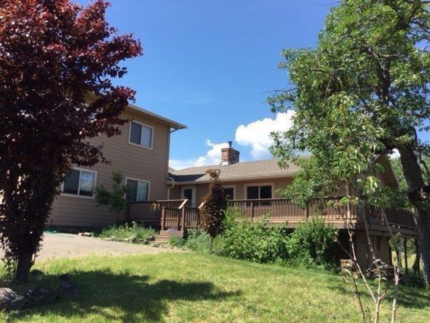 This is a fantastic rural property with tranquil views of Mt Pitt/McLoughlin and surrounding valley. The house sits far back off Hwy 62 and is a great place to live. This contemporary 2-story home offers large bedrooms, a large family room, laundry room and an open beautiful kitchen w/ granite counters and a door right off the kitchen that leads to a deck outside for that gracious county living! Newly planted trees just one year ago adorn the property. Behind the house is over 1400 square feet concrete slab that is wired and ready for your shop/garage or home nursery. This fabulous 5.49 acres is zoned EFU.